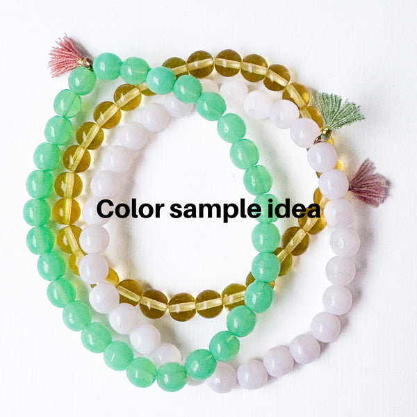 Build your own set of three Smooth Glass Bead Stretch Bracelets with Tassel