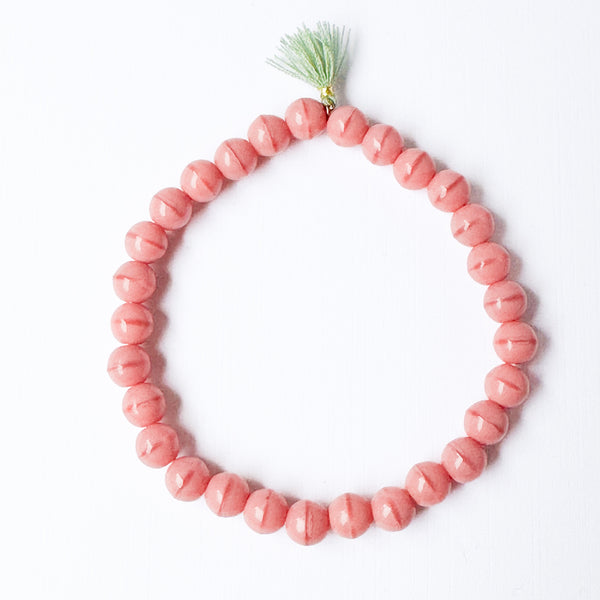 Build your own set of three Smooth Glass Bead Stretch Bracelets with Tassel