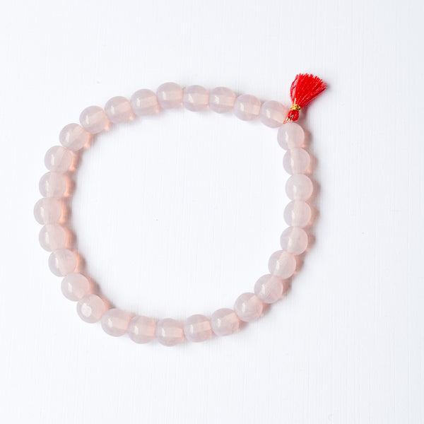 Build your own set of three Smooth Glass Bead Stretch Bracelets with Tassel