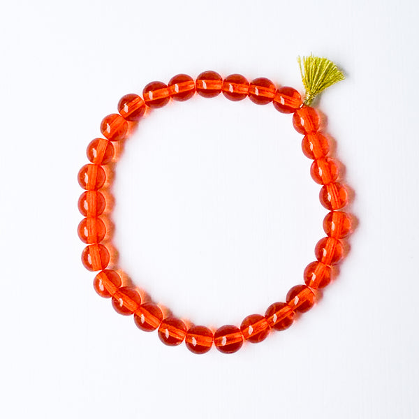 Build your own set of three Smooth Glass Bead Stretch Bracelets with Tassel