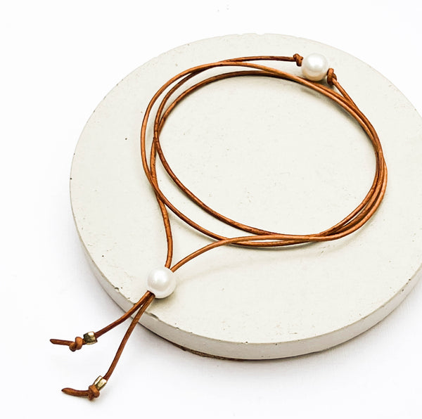 Pearl and leather wrap triple bracelet